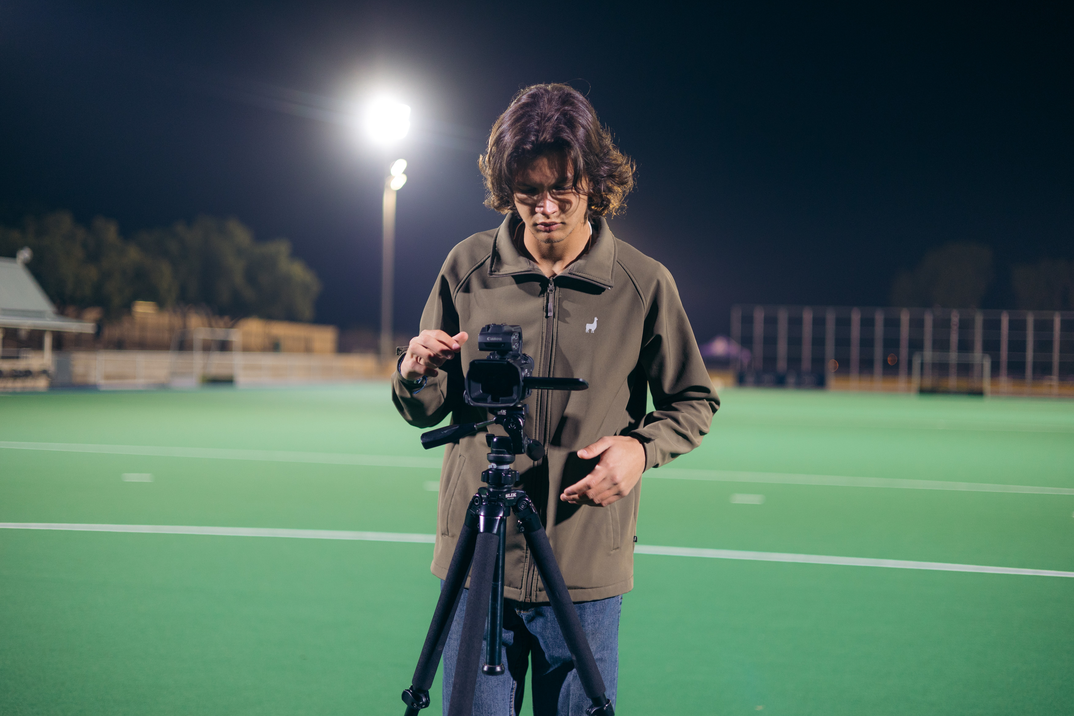 Motion_EXS photographer behind the camera at golden hour